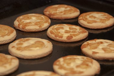 Ready homemade biscuits on a pan.