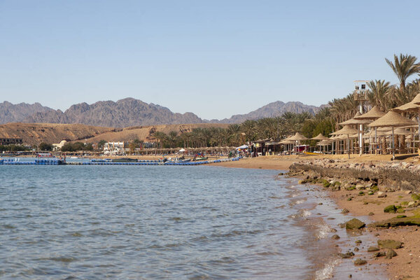 Sharm El Sheikh - Egypt - 10 February 2020 - The view on the sea, beach and sand mountains from an eastern city.