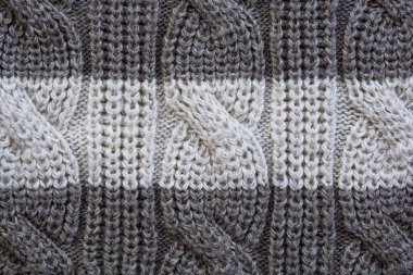 arka plan örülmüş desen iki tonluk koyu kapuçino ve açık renk örgü saçlar yakın plan