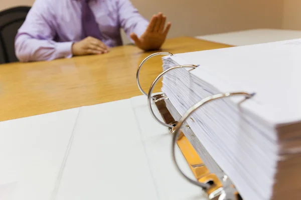 Selective focus Young business man in the office sitting in front of the folder refuse to work — Stock Photo, Image