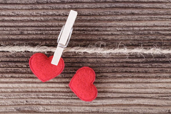 Two red textile hearts on wooden background. Love concept. — Stock Photo, Image