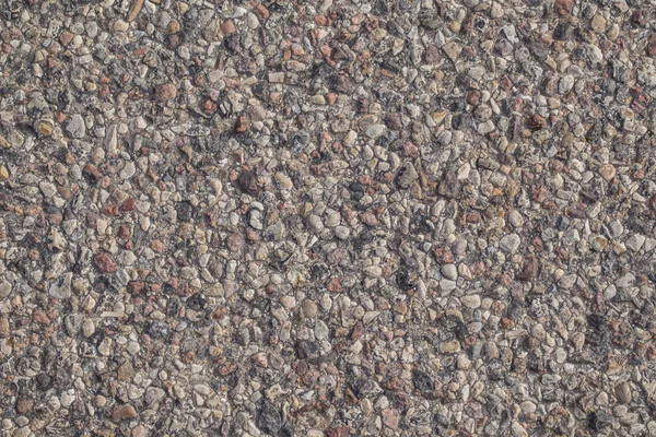 Kleine stenen overstroomd asfalt — Stockfoto