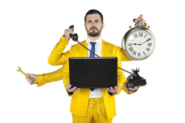 Businessman in a golden suit is very well organized — Stockfoto