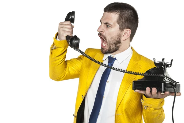Businessman shouting into the phone handset, nerves exploded — ストック写真