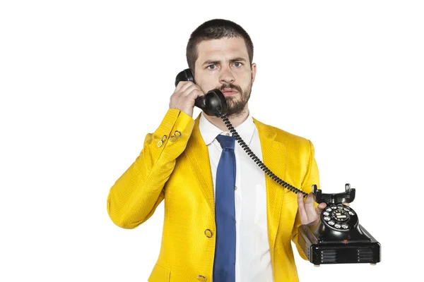 Businessman in a gold suit leads the telephone conversation — ストック写真