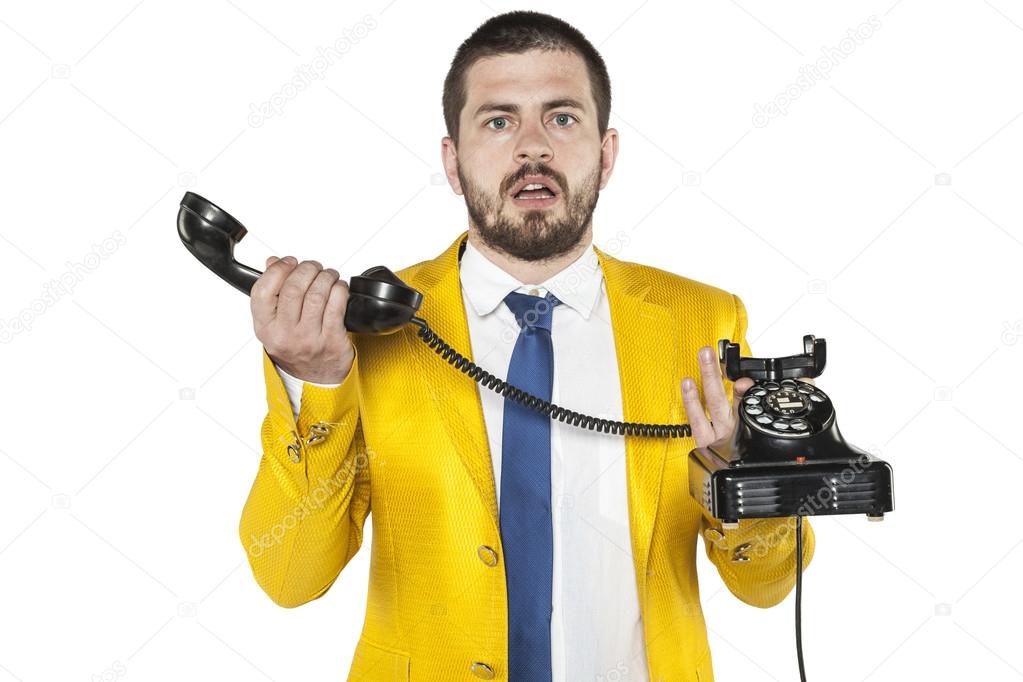 businessman does not know how the old phone