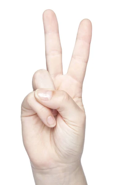 Foto di una mano su sfondo bianco, segno di pace — Foto Stock