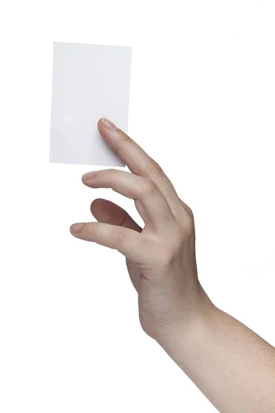 Mano muestra una tarjeta blanca simple, espacio para el texto del anuncio — Foto de Stock