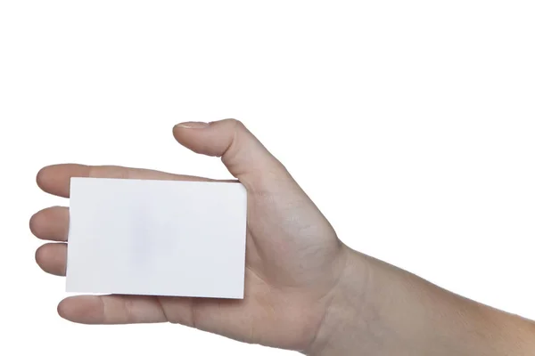 Kleine Visitenkarte in der Hand, weißer Hintergrund — Stockfoto