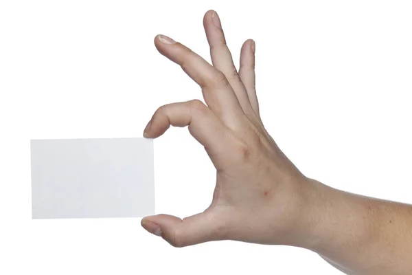 Hoja blanca rectangular sostenida en los dedos, espacio para copiar — Foto de Stock