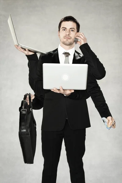 Businessman is a  octopus — Stock Photo, Image