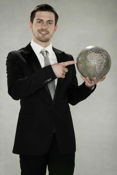 Businessman planing expansion — Stock Photo, Image