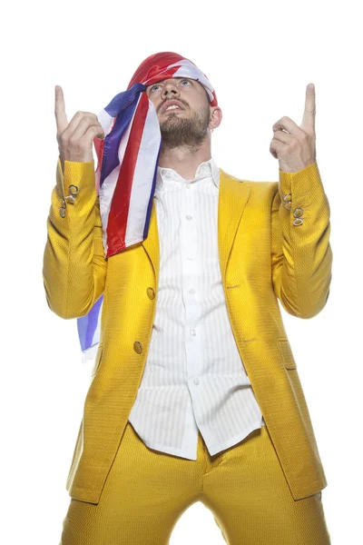 Grote fan, man in een gouden pak — Stockfoto