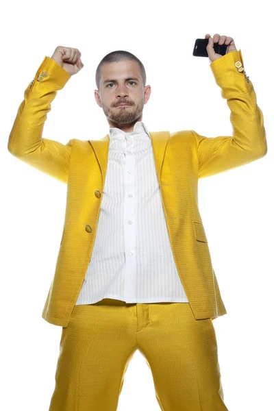 Счастливый бизнесмен в золотом костюме — стоковое фото