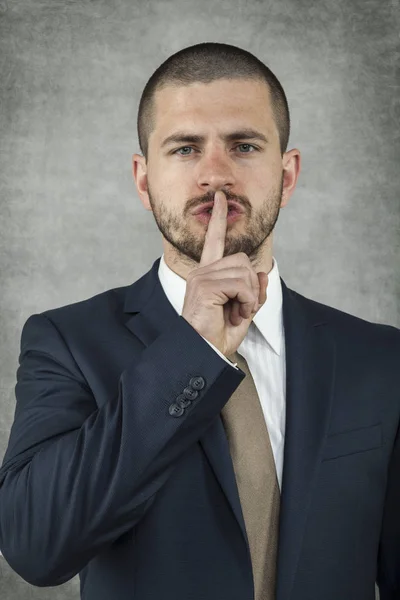 Shh, businessman is gesturing — Stock Photo, Image