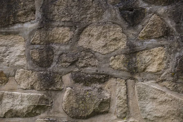 tuğla duvar taş olan