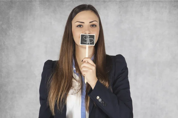 Mujer de negocios cubre la boca con signos de dólar —  Fotos de Stock