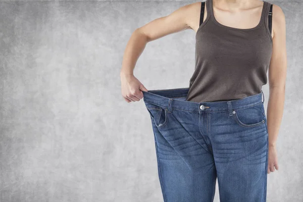 Old pants are too big — Stock Photo, Image