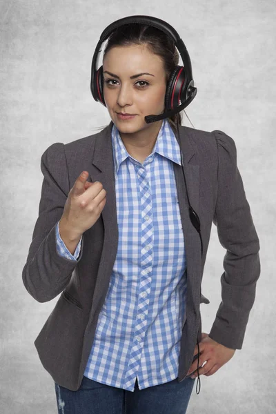 Woman from technical support points to you — Stock Photo, Image