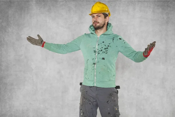 Stavební dělník láme ruce, gesto bezmoci — Stock fotografie