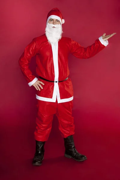 Santa Claus verwijst naar iets — Stockfoto