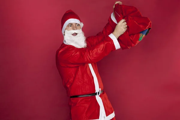 Santa Claus zastanawia się, że torba jest pusty — Zdjęcie stockowe