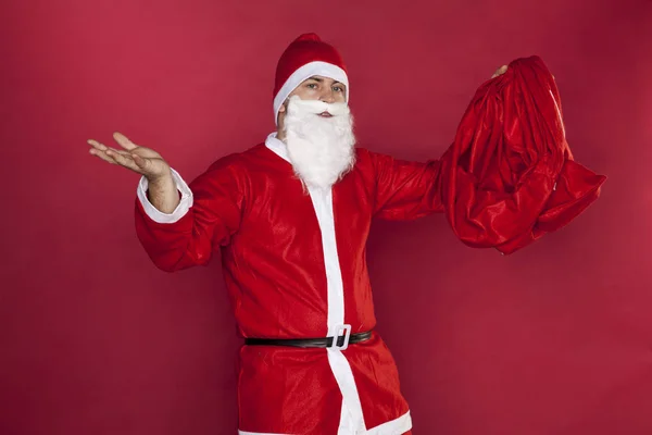 Santa Claus blijkt dat er niets in de zak is — Stockfoto