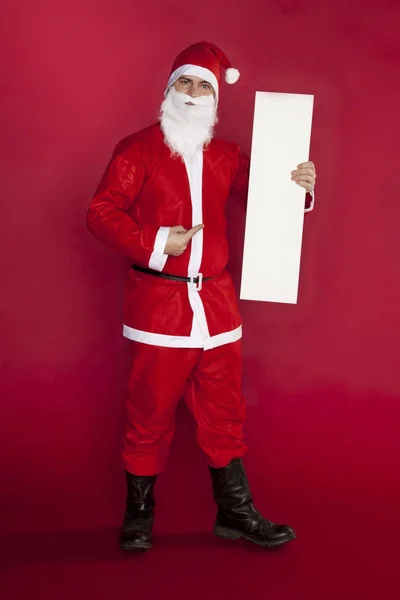 Santa Claus insatisfecho mantiene un lugar para la publicidad, dedicatio — Foto de Stock