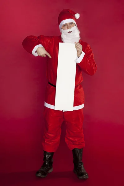 Happy Santa Claus houdt een plaats voor reclame, kopie ruimte — Stockfoto