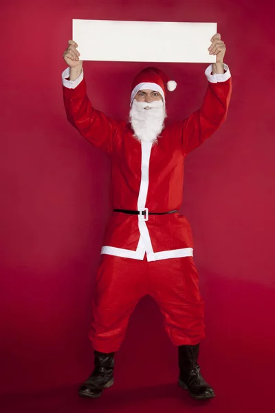 Happy Santa Claus houdt een plaats voor reclame — Stockfoto