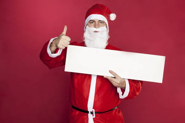 Santa Claus shows thumbs up, copy space — Stock Photo, Image
