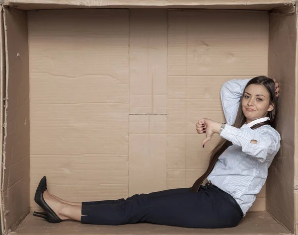 An unemployed student shows a thumbs down — Stock Photo, Image