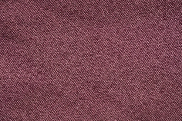 Donker rode stof, close-up van een patroon — Stockfoto