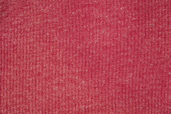 Fabric in red color, closeup on stitch — Stock Photo, Image