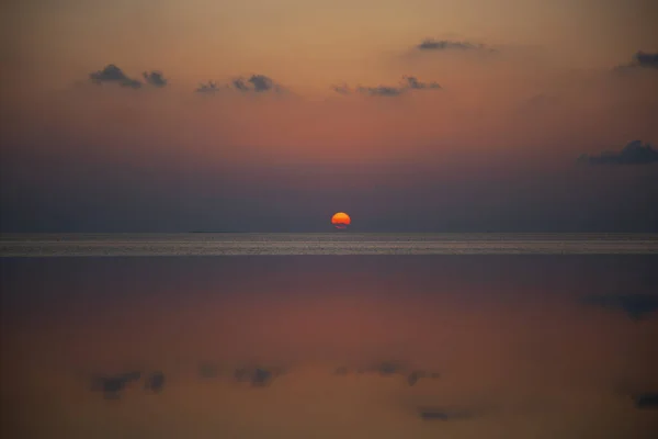 Sunset in the distance, reflection of the sky in the pool water — 스톡 사진