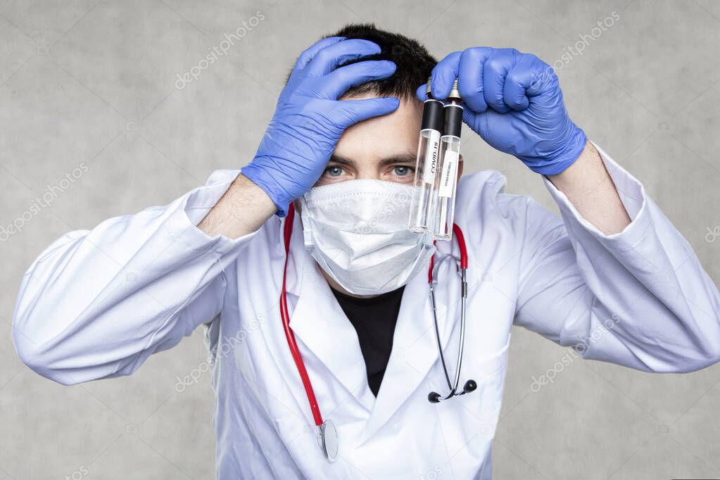  devastated doctor grabs the head, ampoules for genetic material