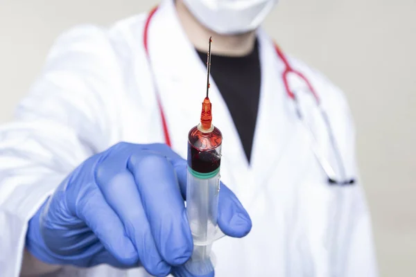 Doctor Holds Syringe His Hand Filled Red Liquid Concept Blood — Stock Photo, Image