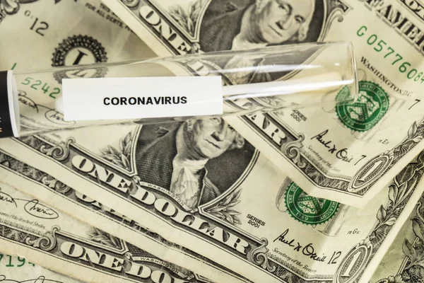 Coronavirus testleri bir dolarlık banknotta, salgının sembolü ve bununla ilgili maliyetler üzerine kuruludur.