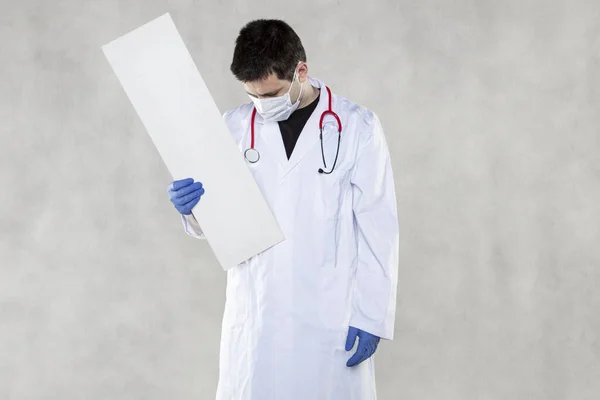 doctor holds boards with or for information, warning concept