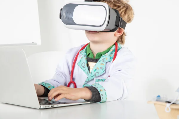 young doctor in virtual reality goggles is working on a 3D model of the virus