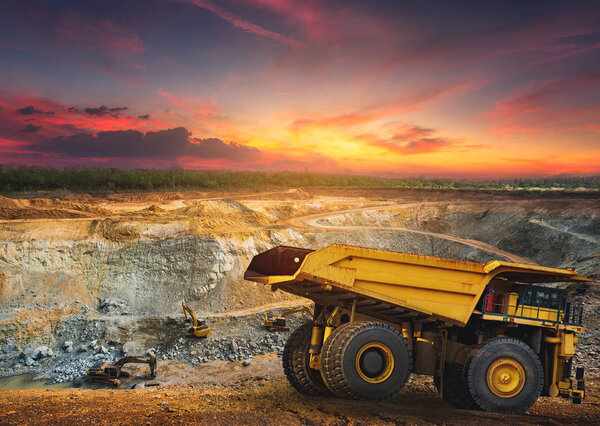 Dump truck loading minerals in mining