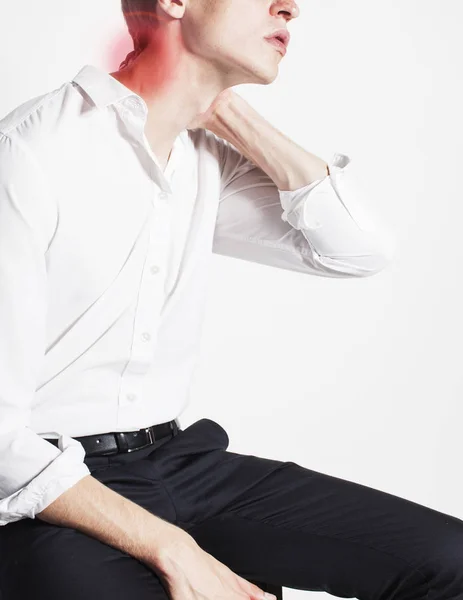 Businessman holding neck — Stock Image Businessman holding neck Stock Image