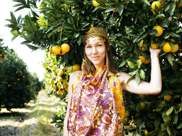 pretty islam woman in orange grove