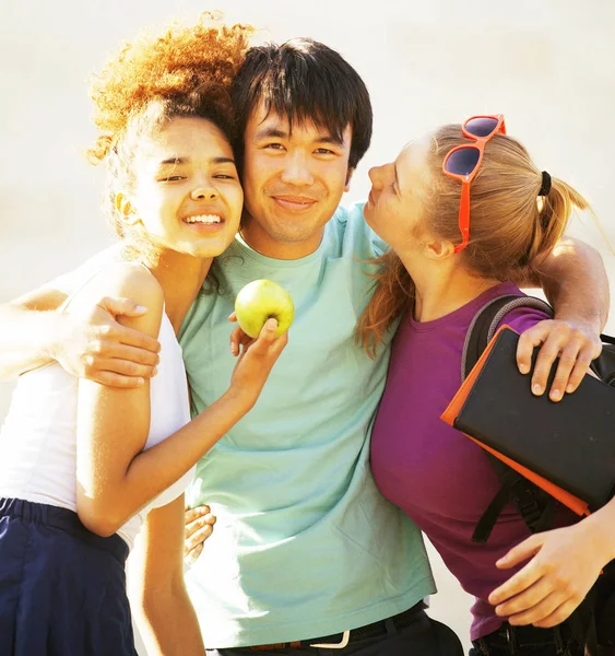 teenagers at the building of university