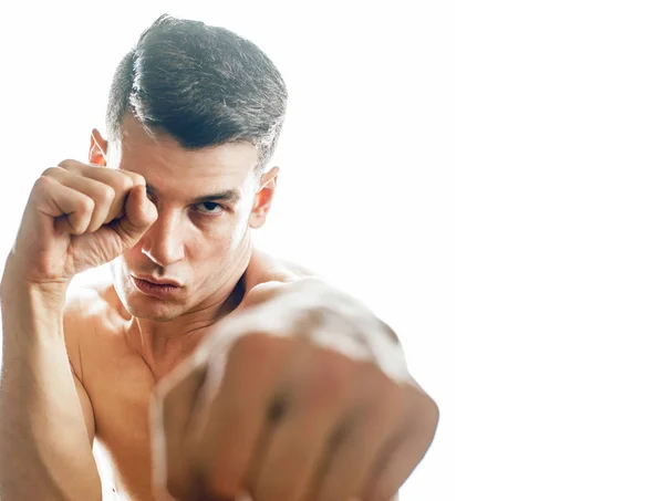 young handsome agressive man boxing isolared on white background, lifestyle sport people concept