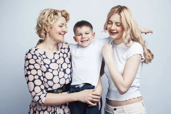 happy smiling blond family together posing cheerful on white background, generation concept. lifestyle people