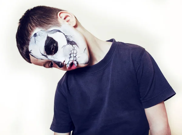 Little cute boy with facepaint like skeleton to celebrate halloween,  lifestyle people concept, children on holiday Stock Photo by ©iordani  361234898