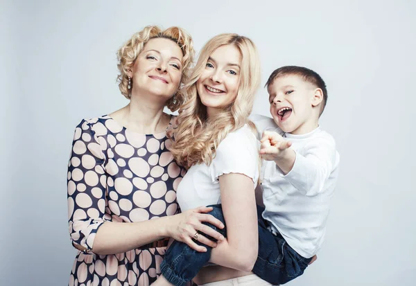 happy smiling blond family together posing cheerful on white background, generation concept. lifestyle people