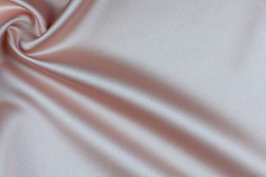 Doymuş pembe renkli ipek detaylı kumaş. 