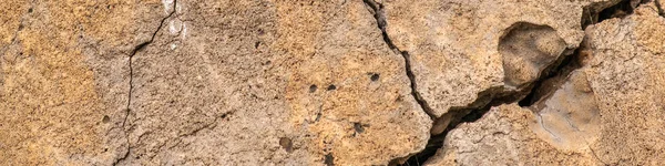 Трещина в бетонной текстуре крупным планом. Абстрактный цемент — стоковое фото